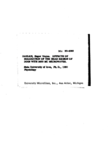 Effects of irradiation of the head region of dogs with 2450 MC microwaves
